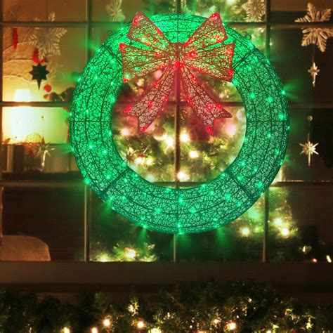 The Holiday Aisle® Lighted Christmas Wreath Outdoor Decorations, 24In ...