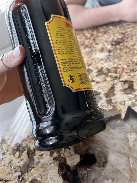 Why is the bottom of my Kahlua bottle indented? I’ve googled it and can ...