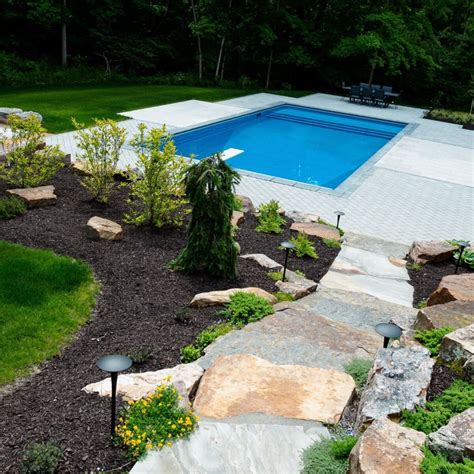 20 Stunning Inground Pool Landscaping Ideas To Inspire Your Backyard Oasis