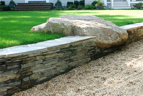 Stacking River Rock Retaining Wall