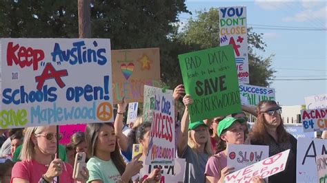 Families rally at Austin ISD headquarters to oppose school ...