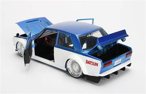 JDM Tuners 1:24 1973 Datsun 510 Widebody Jon Sibal Blue/White Die-cast ...