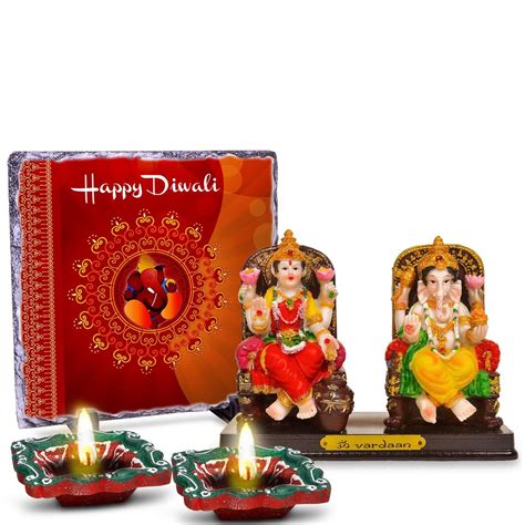 Buy May The Blessings of Lord Ganesha 2 Diyas, Laxmi Ganesha & Rock ...