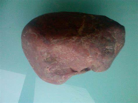 谁知道这红石头是什么石头？很漂亮的红色，很普通的样子，但想知道是什么石头。_百度知道