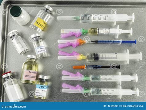 Syringes Loaded with Medication Next To Medicine Vials Prepared in ...