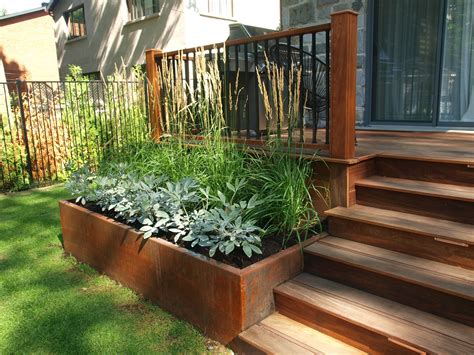 Ipe deck and staircase; custom raised planter box in corten ...