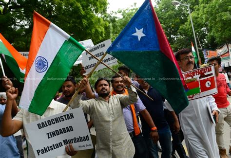 Buy Hindu Sena stages protest waves Balochistan flag Pictures, Images ...