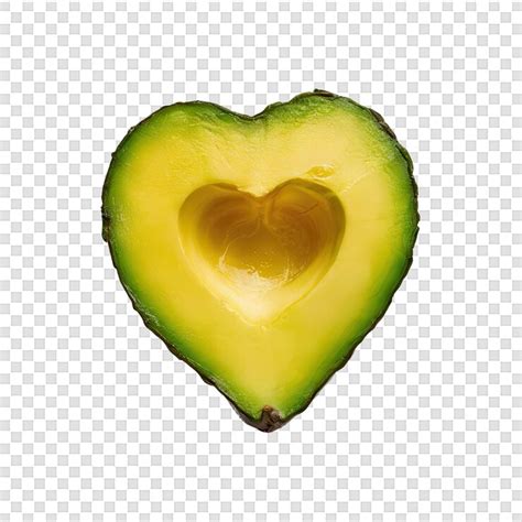 An avocado cut in half with a heart shaped cut in the middle | Premium ...