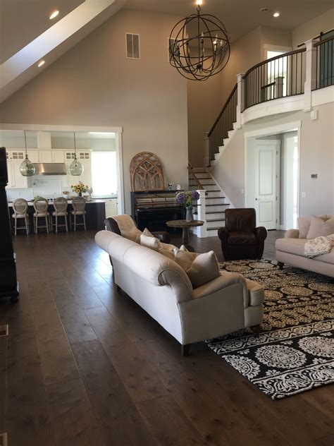 Contemporary Living Room with Modern High Ceilings and Dark Hardwood Floors