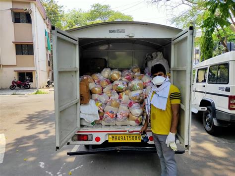 CMPDI distribute masks and food kit