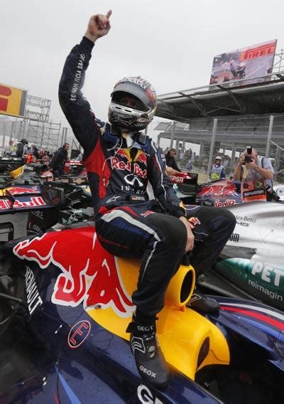 Vettel becomes F1's youngest triple champion - Rediff Sports