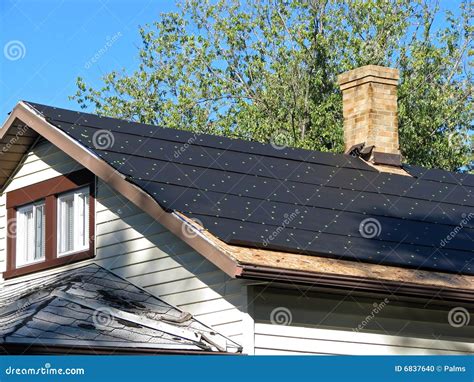 Tar paper on a roof stock photo. Image of replacement - 6837640
