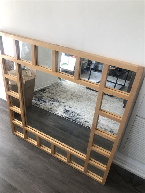 How to Hang a Heavy Mirror Without Nails: Easy and Damage-Free - MirrorTopics