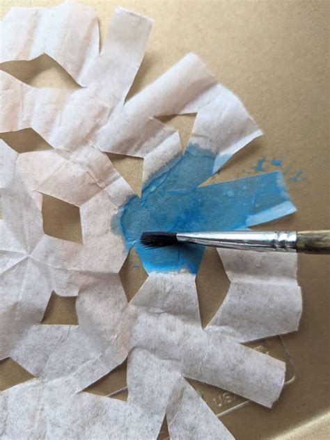 How to Make Coffee Filter Snowflakes - Nature Inspired Learning