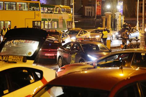 Rush hour Dublin traffic disrupted by taxi protest against Uber fixed fares – The Irish Times