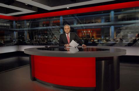 Going live: BBC News lead presenter Huw Edwards