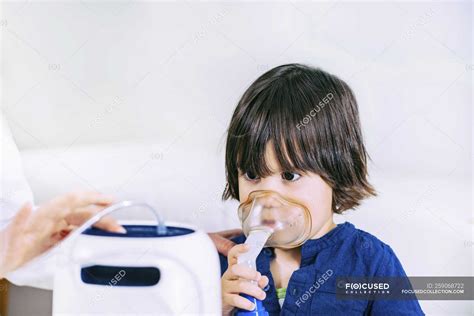 Image result for Using Inhaler and Mask