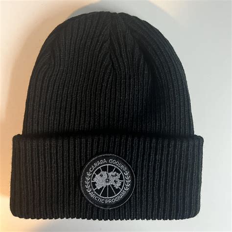 Canada goose beanie black badge great condition... - Depop