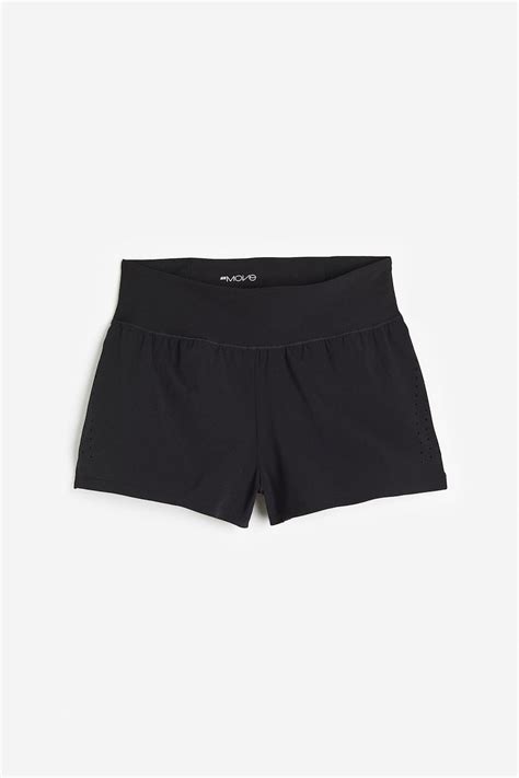 DryMove™ Double-layered sports shorts - Black - Ladies | H&M IN
