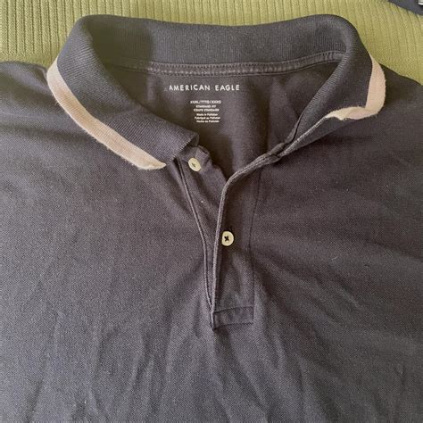 Blue American Eagle Outfitters Polo. White stripes... - Depop