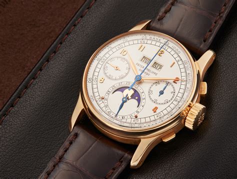 Reference 1518 | A yellow gold perpetual calendar chronograph ...