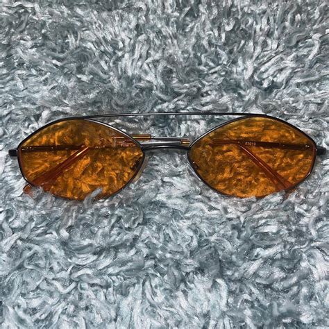 Orange Tinted Sunglasses Worn a few times Minor... - Depop