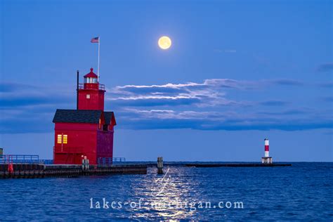 Holland Big Red Lighthouse at Night with Full Moon - April 16th, 2022 — Aerial, Landscape, Real ...