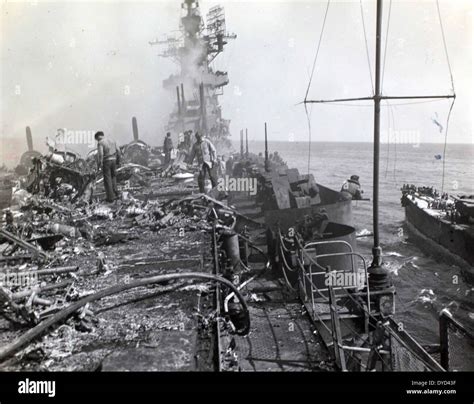 This photograph shows battle damage sustained by the USS Bunker Hill ...