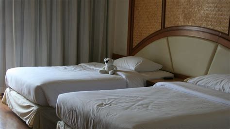 Download wallpaper 1366x768 interior, hotel, beds, teddy bear tablet ...