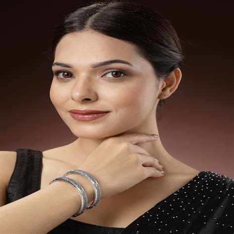 Buy NVR Women Silver-Toned German Peacock Design Oxidised Kada Bangle ...