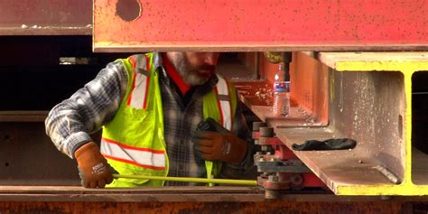 Ozark Mill begins sliding back to its original location.