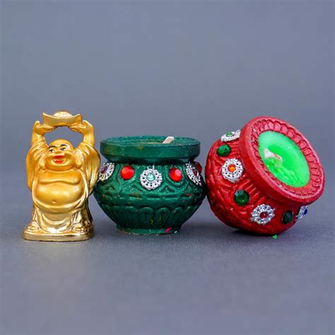 Send Laughing Buddha with Diya N Candle Gift Hamper Online - DW22 ...