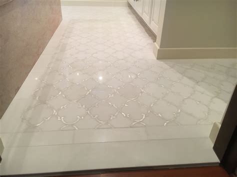 White Marble Bathroom Flooring with Mother of Pearl Detail