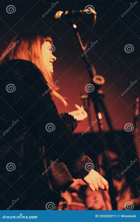 Red-haired Attractive Hispanic Singer on Stage. Stock Image - Image of ...