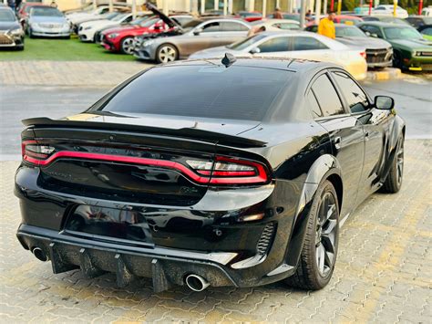 Kandy Cars - {2021 Dodge Charger RT - # 65894 (R)}