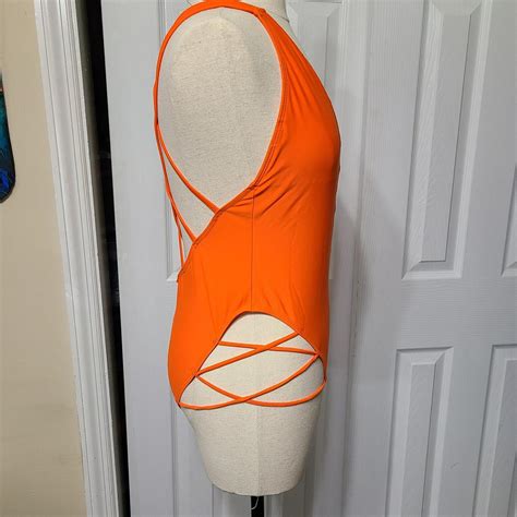 Medium neon orange one-piece swimsuit. - Depop