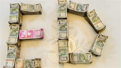 ED seizes over Rs 91 lakh cash after raids in Indore land fraud case ...