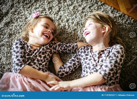 Fun on Floor. Two Little Girls Playing at Home. Stock Image - Image of ...