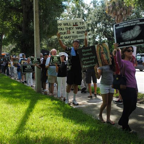 Pro-life group protests Planned Parenthood at Bill Nelson's Orlando office