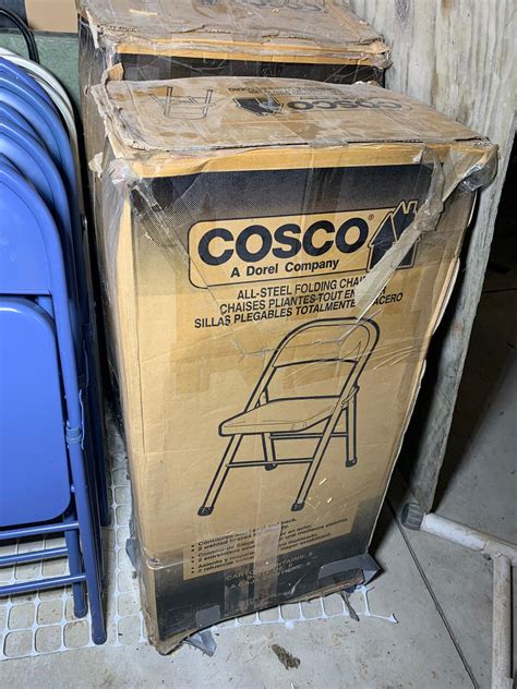 Lot 2194 - Group Lot of Folding Chairs Some still in COSTCO Boxes | Burns Auction & Appraisal