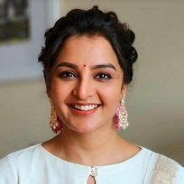 Manju Warrier - Movies, Biography, News, Age & Photos | BookMyShow