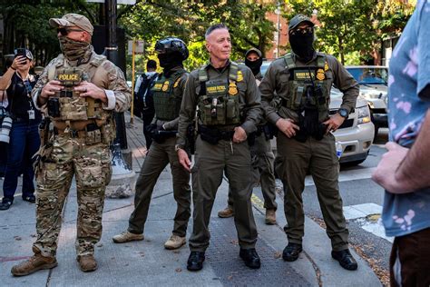 Protester shot in Chicago by border patrol agents who claim they were ...