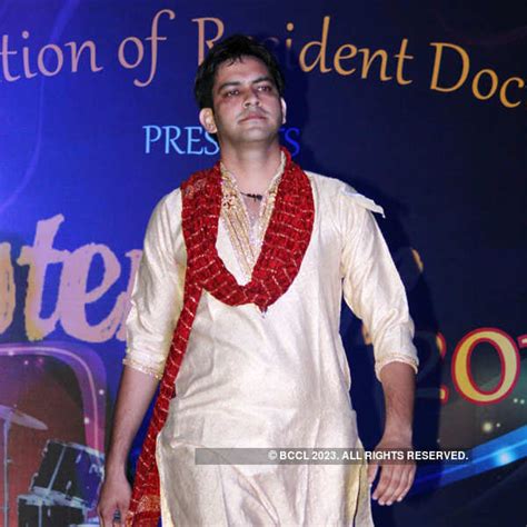 A student showcases a creation in a fashion show during Festember 2013 ...