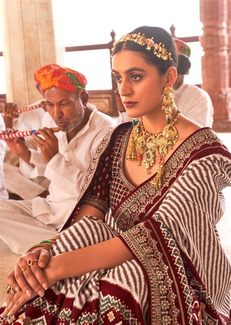 White and Maroon Red Sequins Patola Saree – Sunasa