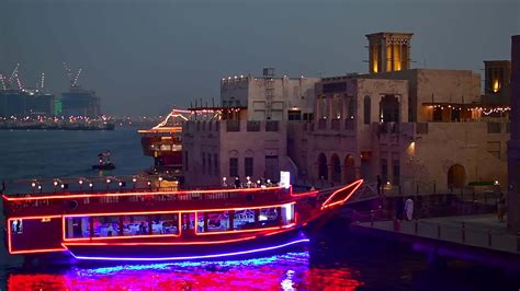 Dubai, UAE , 2022 - illuminated vintage vessel restaurant - boat docked ...