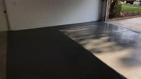Costco rubber garage flooring mats 7.5' x 17'. Three of them overlap ...