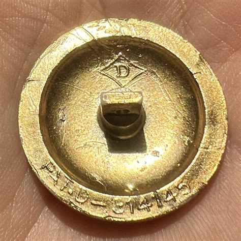 Lot Detail - Vintage Diamond D button of “safety pins.”