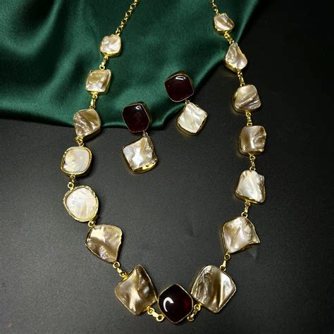 Zuri mother of pearl necklace set with ruby stone – Bhavdiya Aesthetic