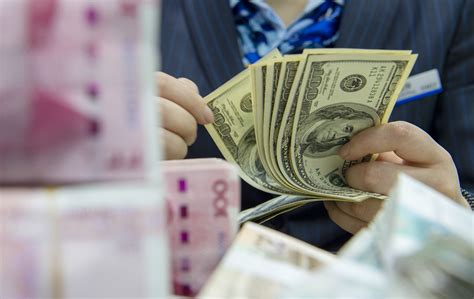 中国央行：不要赌人民币汇率单边升贬，久赌必输-侨报网