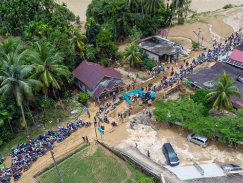 In pics: Flash floods and landslides wreak havoc in Indonesia; several ...